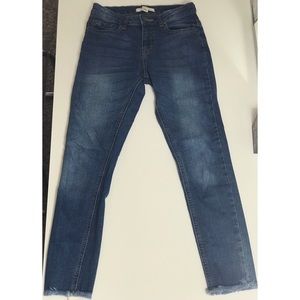 Medium wash low rise blue jeans